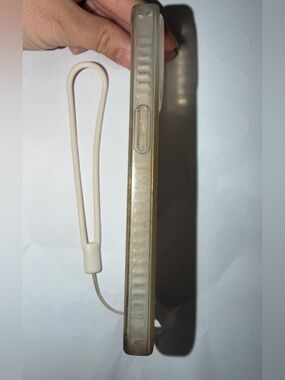 White Opal iPhone 15 Pro case with silicone wrist band